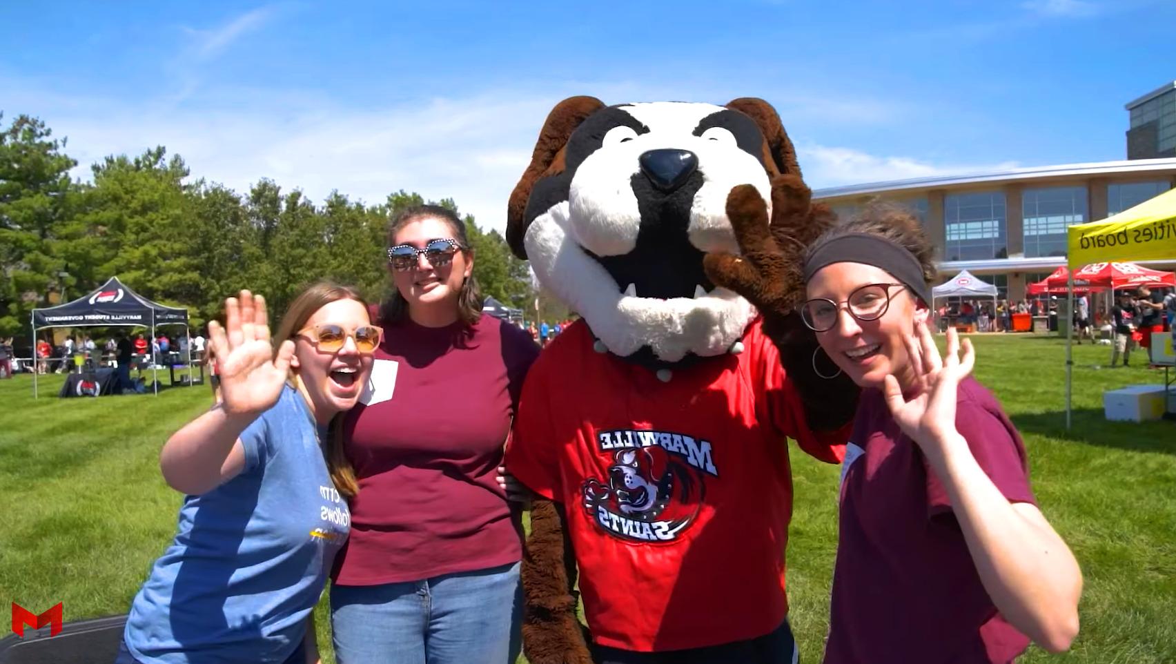 Maryville students and Louie saying hello